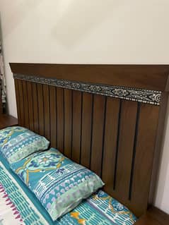 king size wooden bed with dressing