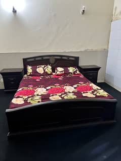 Bed with side table or dressing table