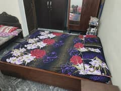 Square wooden double bed