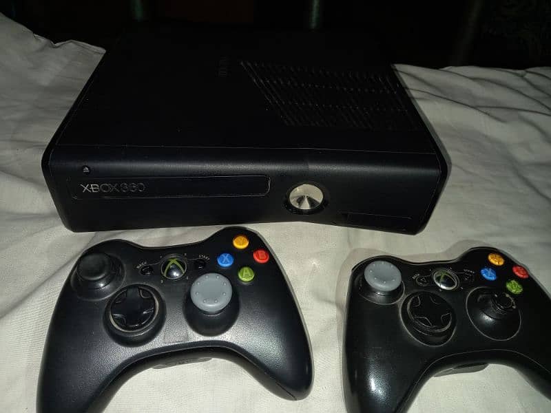 Xbox 360 with 2 controllers. 1