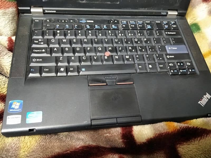 The laptop is in good condition with original charger 2