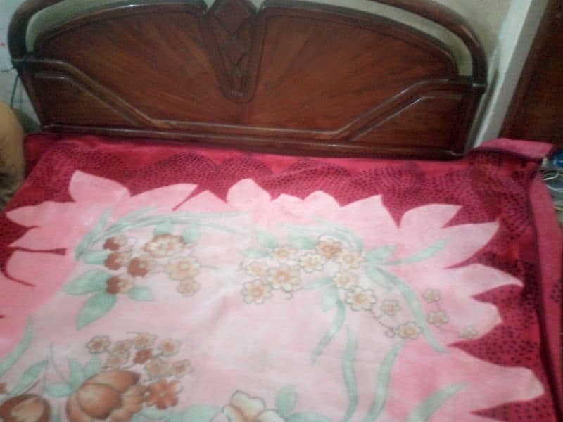 Double bed with new mattress and wooden sheet 1