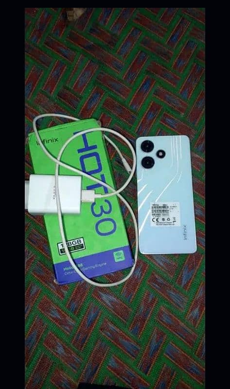 Infinix hot 30 8/128 with box charger condition. 10/8 2