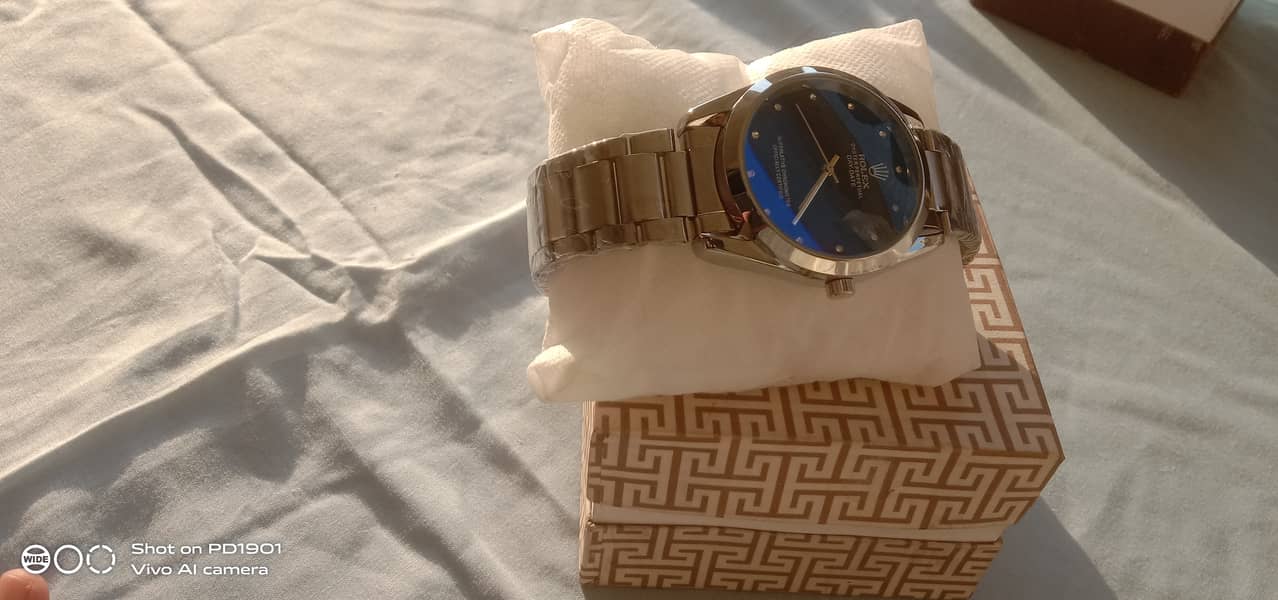 4 watches Rolex and delivery with Karachi and 12 holy sell price. 4