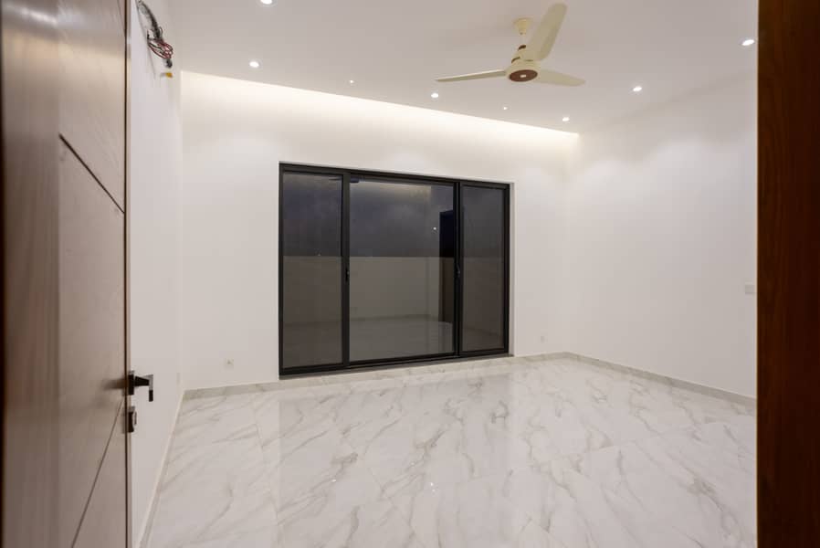 21 Marla Modern Brand New Villa For Sale In DHA Phase 7 U Block 70' Ft Road 13