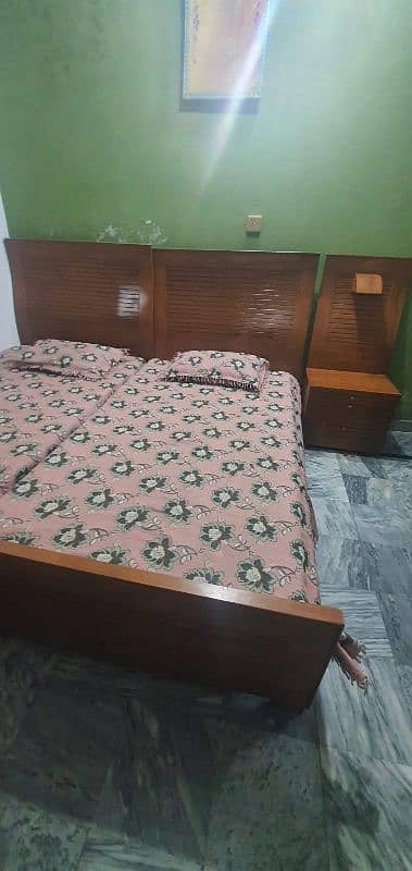 2 single beds along with medicated mattress with one side table 1