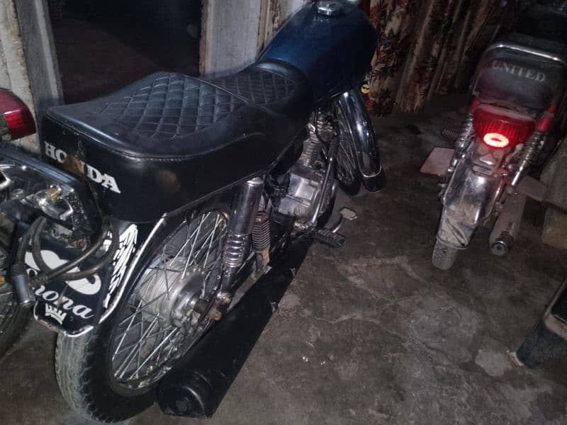 Honda 125 1998 model good condition urgent sale need Money 4