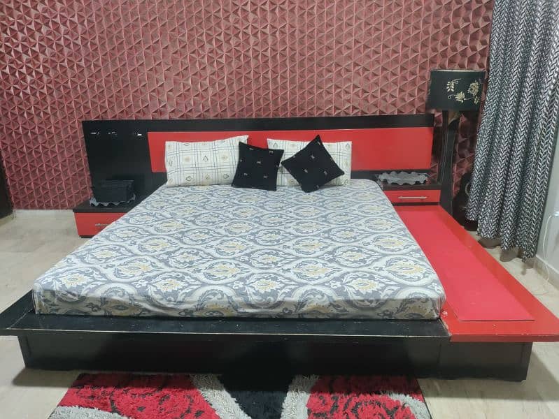 Wooden black an red color bed 3