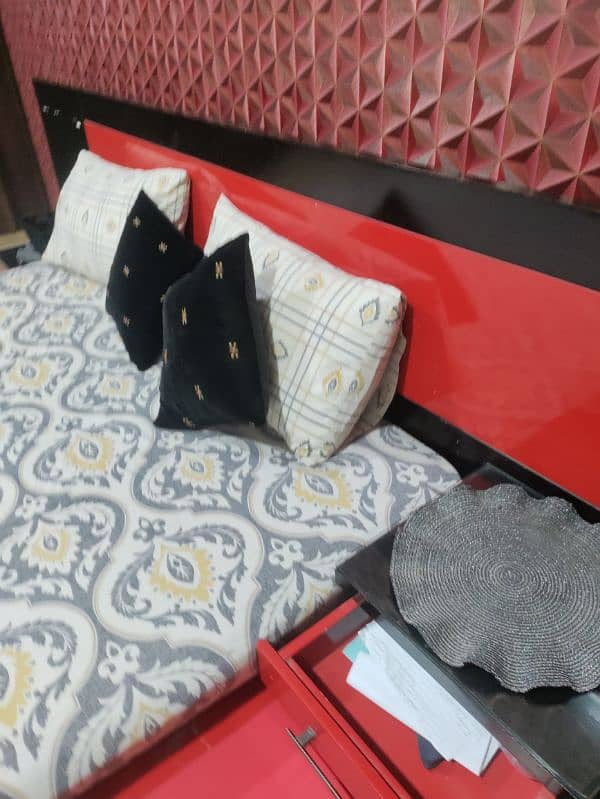 Wooden black an red color bed 4