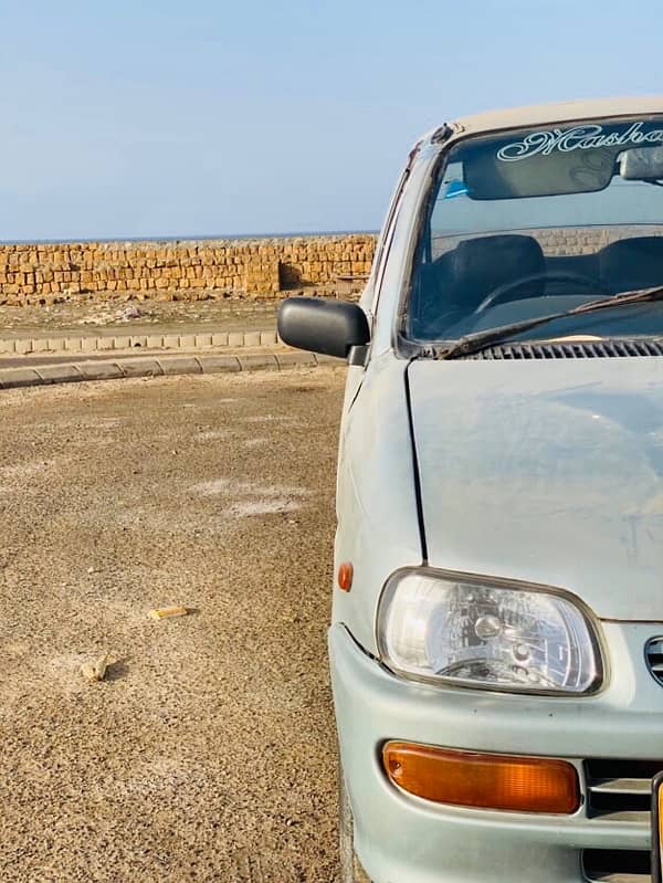 Coure 2003 better than Alto Mehran Cultus Baleno liana Khyber Charade 1