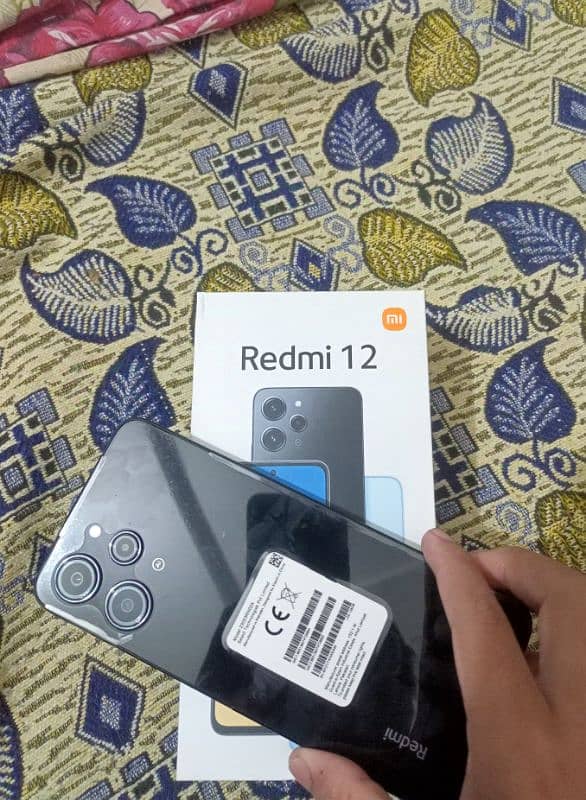 xiome Redmi 12 Brand New mobile 8_128 GB one Hand Use 3