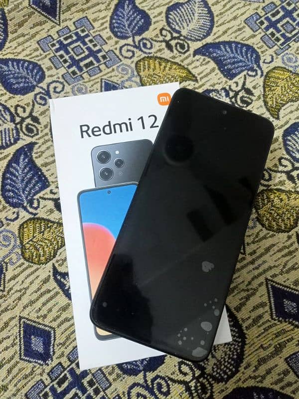 xiome Redmi 12 Brand New mobile 8_128 GB one Hand Use 4