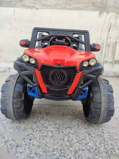 4 by 4 kids jeep with charger and remote in red and black combo