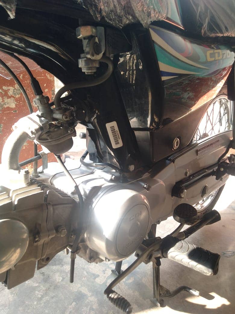 Honda CD 70 2024 5