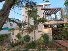 10 Marla Beautiful House With Basement For Rent In Overseas B Block Bahria Town,Lahore