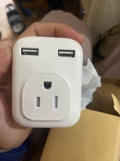 Travel adapter 16Amp USB out 2.5A genuine