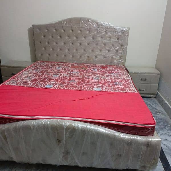 bed with mattress and side table 0