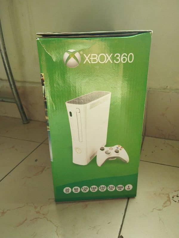 Xbox 360 arcade with 320 gb storage and 2 controller 2