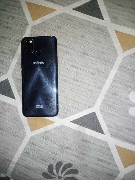 infinix smart 5 3/64 with charger no open repair 3