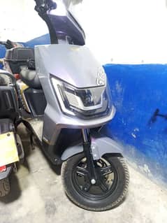 electric automatic scooter and lectrix tri wheeler