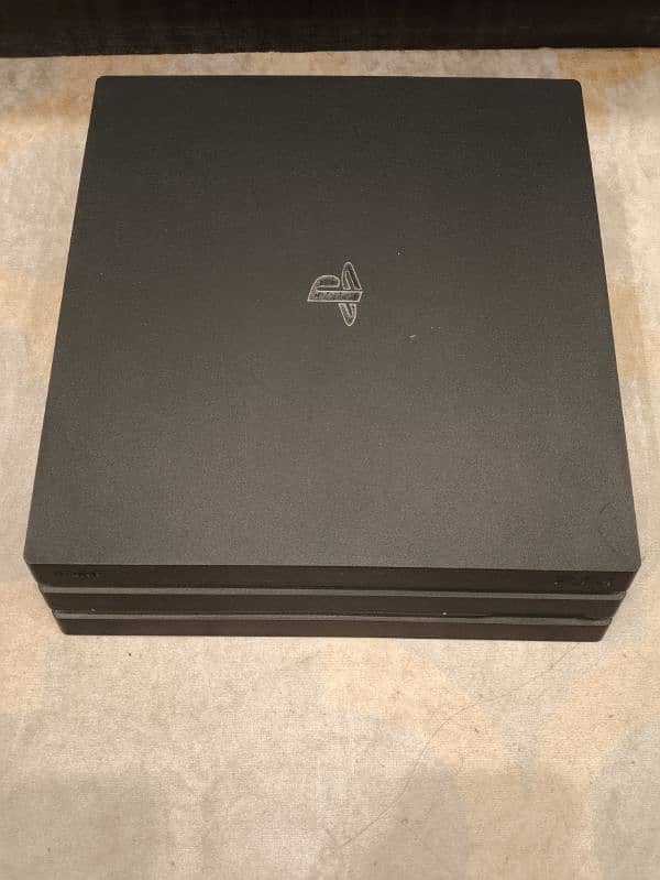 PS 4 PRO 1 TB WITH CONTROLLERS AND GAMES 1