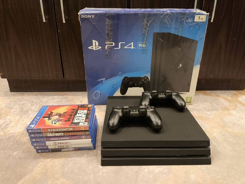 PS 4 PRO 1 TB WITH CONTROLLERS AND GAMES 11