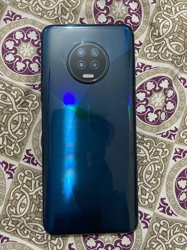 i am selling infinix note 7   6/128GB with box 6