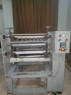 Thermal paper slitter and rewinder