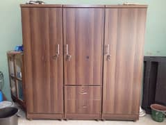 3 door wooden cupboard