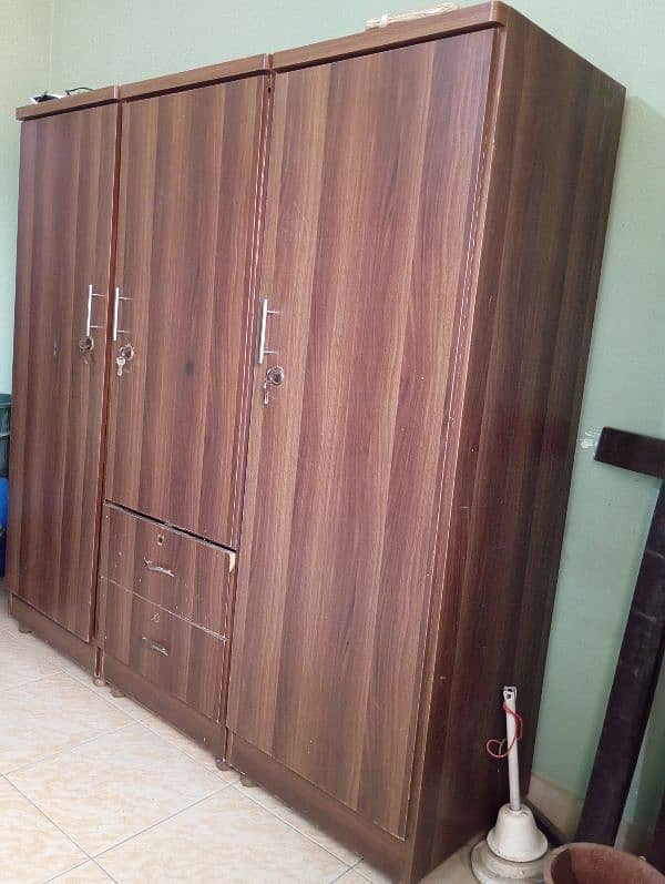 3 door wooden cupboard 1