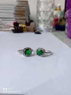 green emerald rings