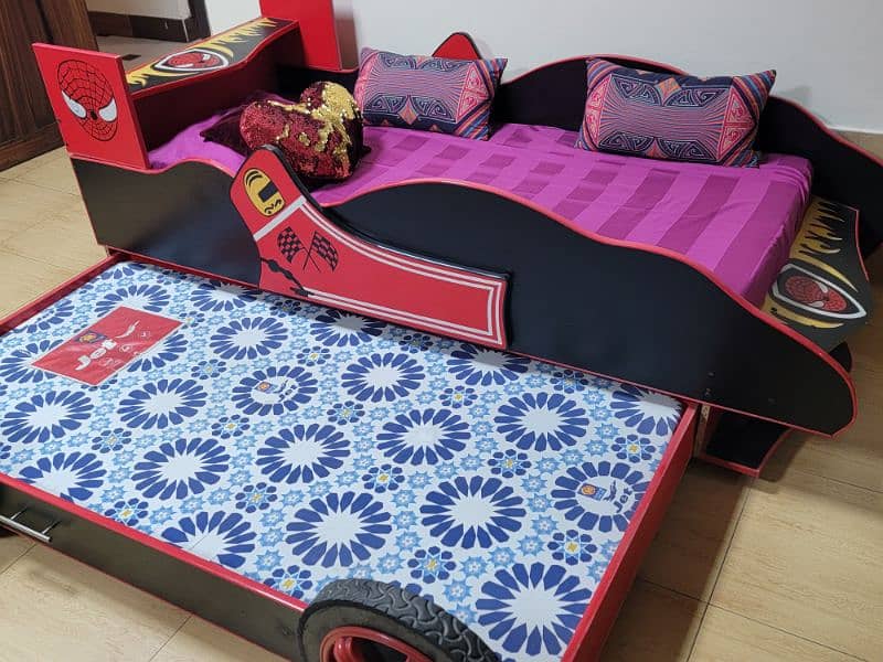 single  bed with sliding additional bed. 9