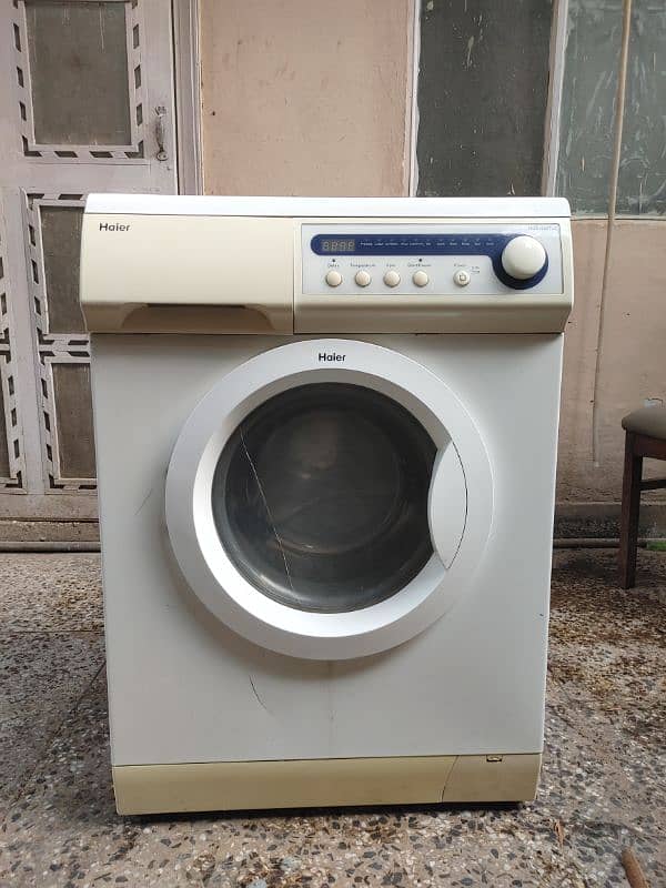 HAIER FRONT LOAD WASHING MACHINE 0