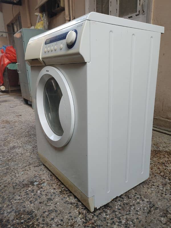 HAIER FRONT LOAD WASHING MACHINE 1