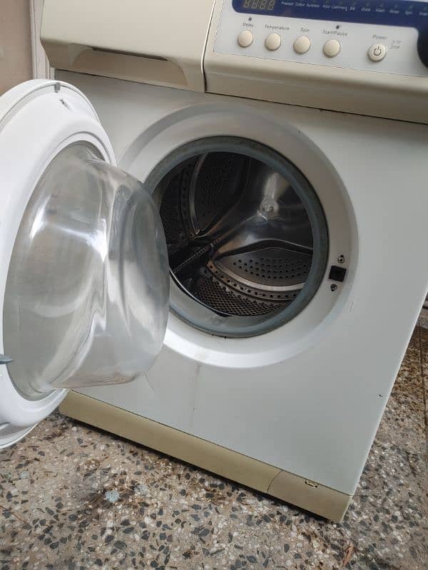 HAIER FRONT LOAD WASHING MACHINE 7