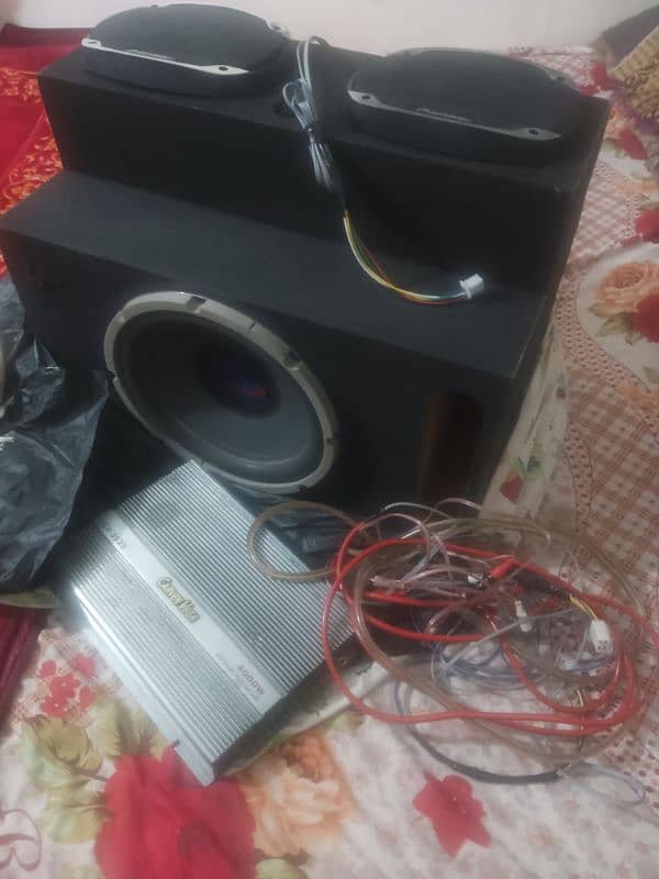 03452222000.4channel amplifier 12 inch woofer and heavy speaker 5