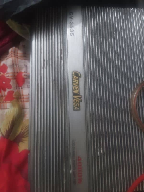 03452222000.4channel amplifier 12 inch woofer and heavy speaker 6