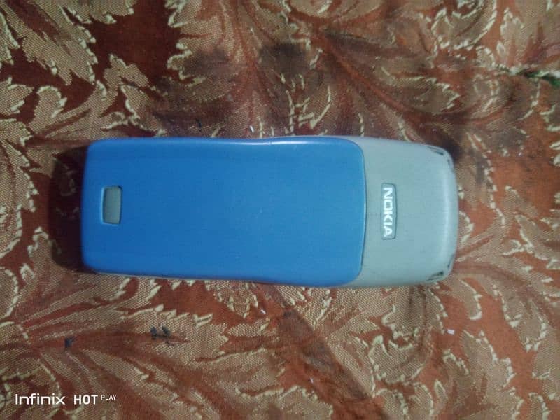 Nokia 1100 original with original chargare 1