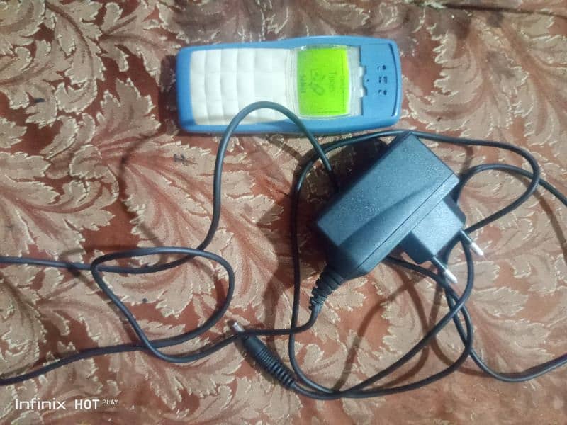 Nokia 1100 original with original chargare 2