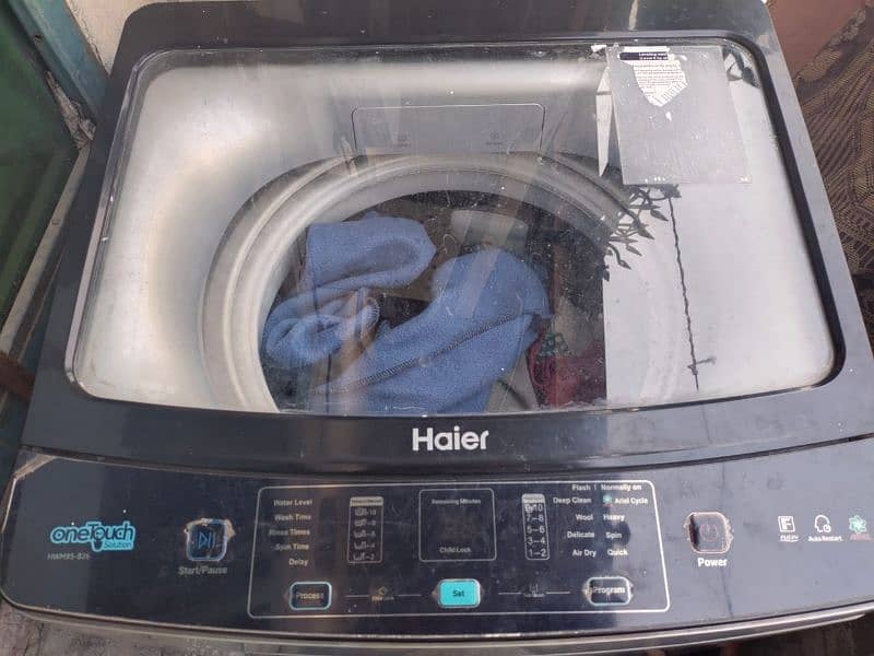 10/9 condition fully automatic Haier 8kg Washing machine. 4