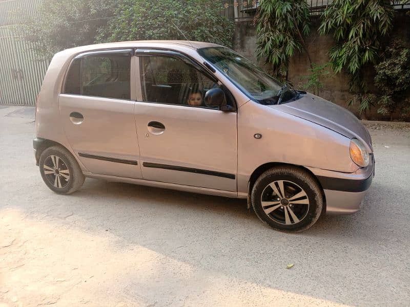 Hyundai Santro 2003 batter then mehran alto cuore cultus 2