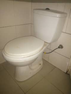 Almost new toilet with flash tank