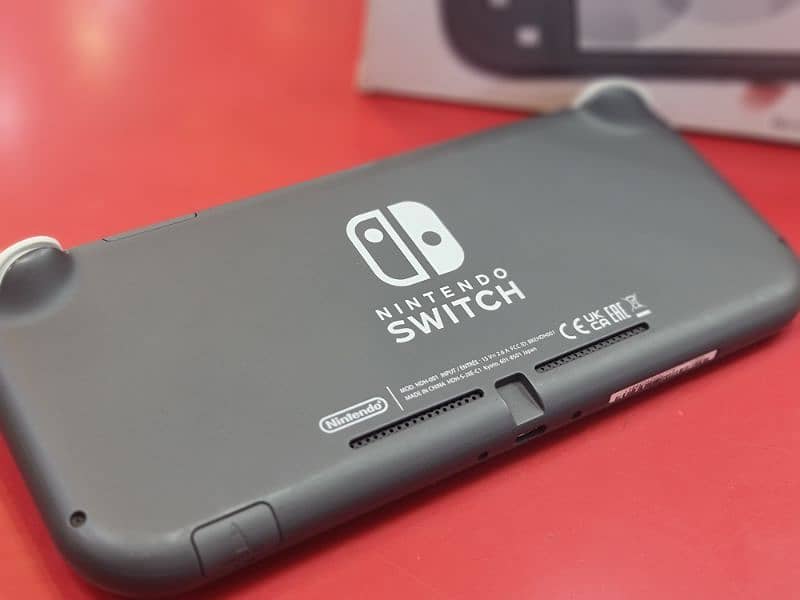 Nintendo Switch Lite (Grey Mint Condition] 3