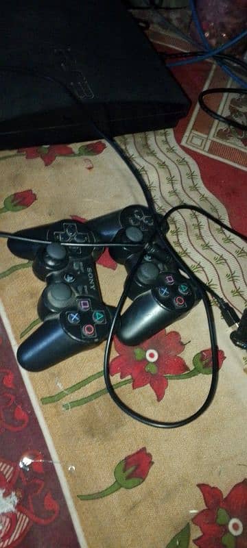 play station 3 slim good condition 2