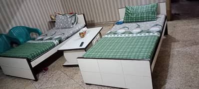 two single beds with mattress and table full set