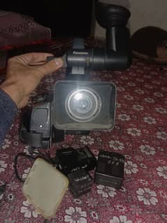 Camera name Hd. 1 hai video camera battery and bags for sale.