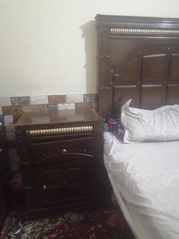 king size bed without mattress dressing table and side tables 0