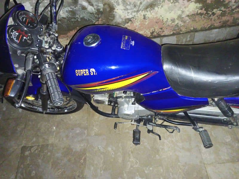 super star 100cc 2014 model self start disc brake 1200 km driven 1