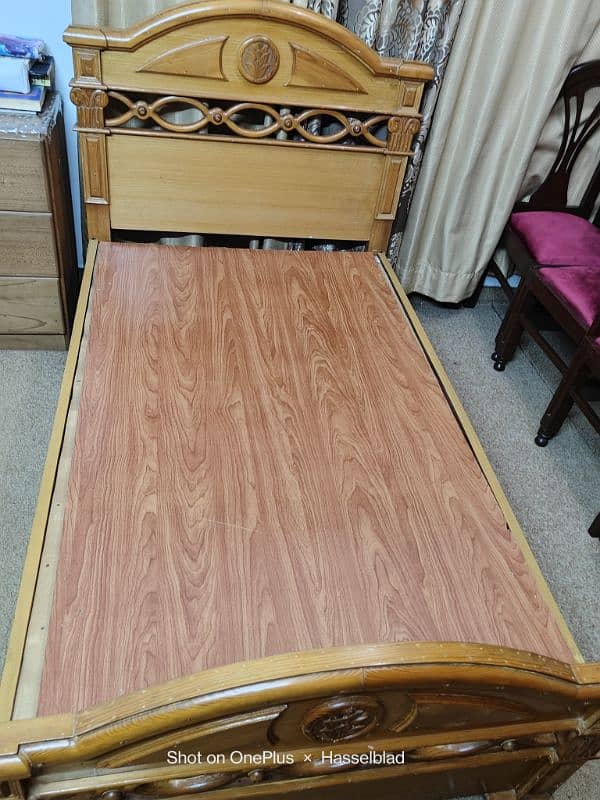 single wooden bed 1