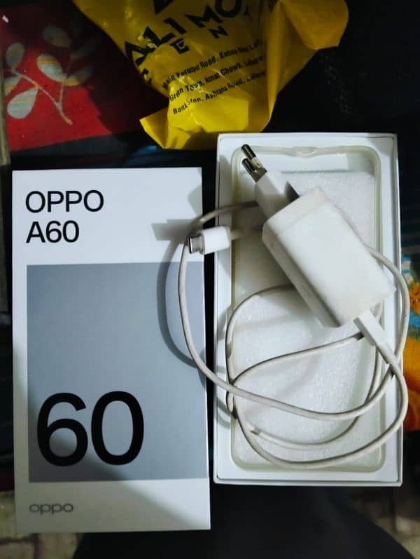 oppo a60   8/128 box with charger 1